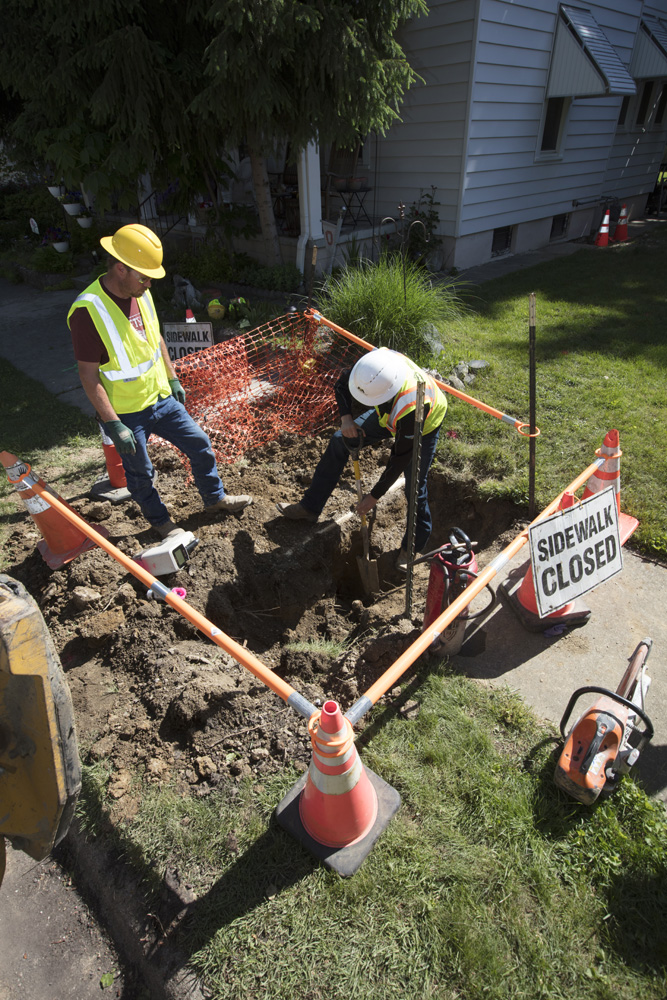 Laborer digging on job site